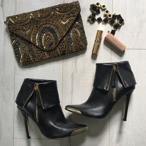 Black and gold booties
